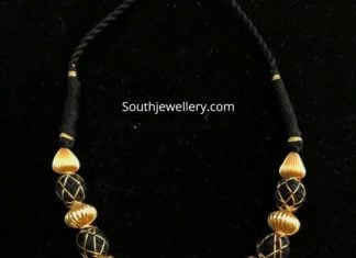 black thread nakshi balls necklace