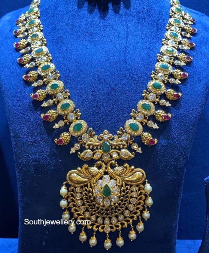 Antique gold mango haram with peacock pendant