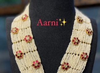 multi strand pearl haram with floral kundan motifs